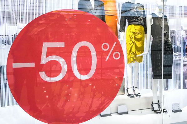 
                        50% discount sticker on a fashion store window
                                              